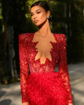 BEADED RED CORSET DRESS WITH LONG FEATHER SKIRT