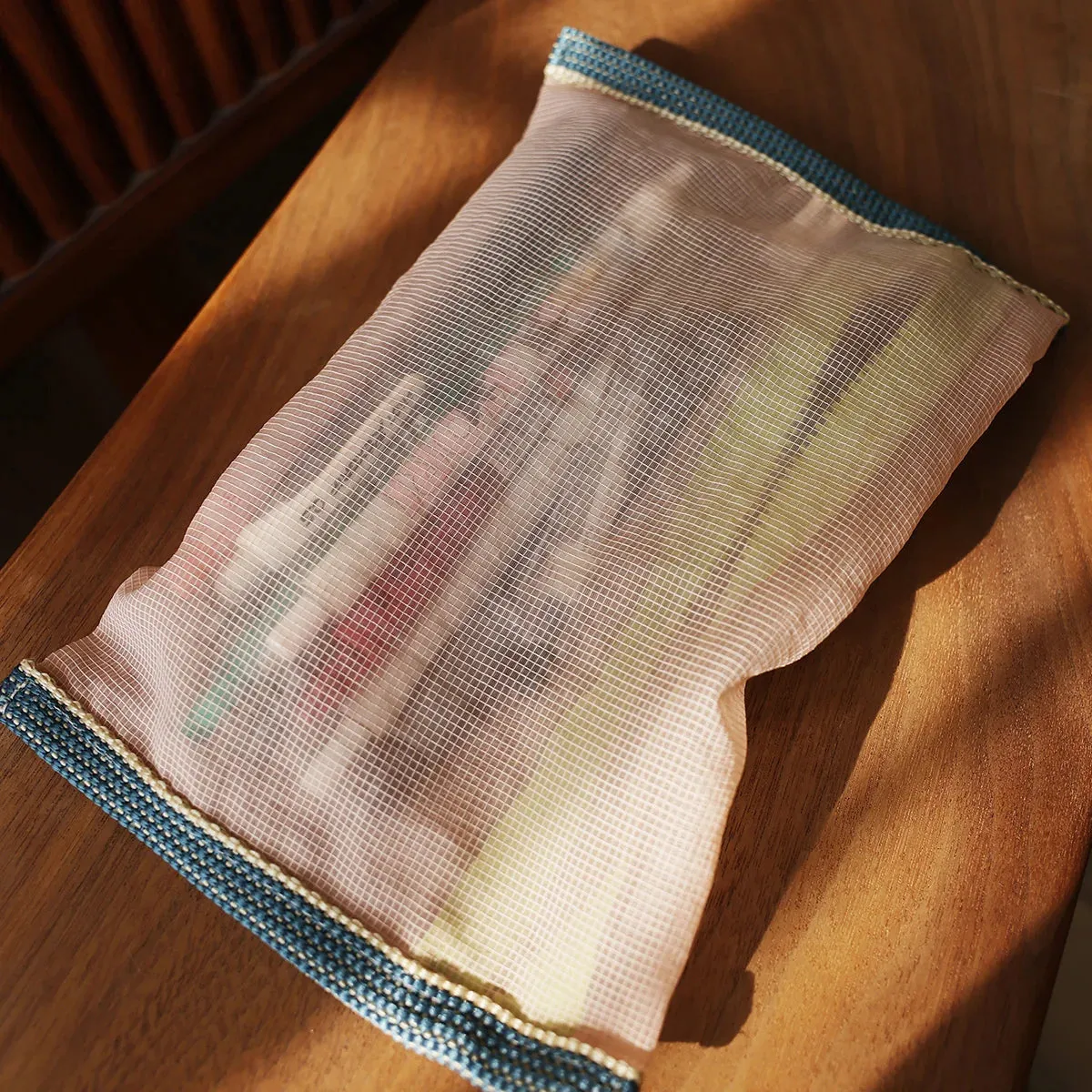 Translucent mesh nylon storage bag
