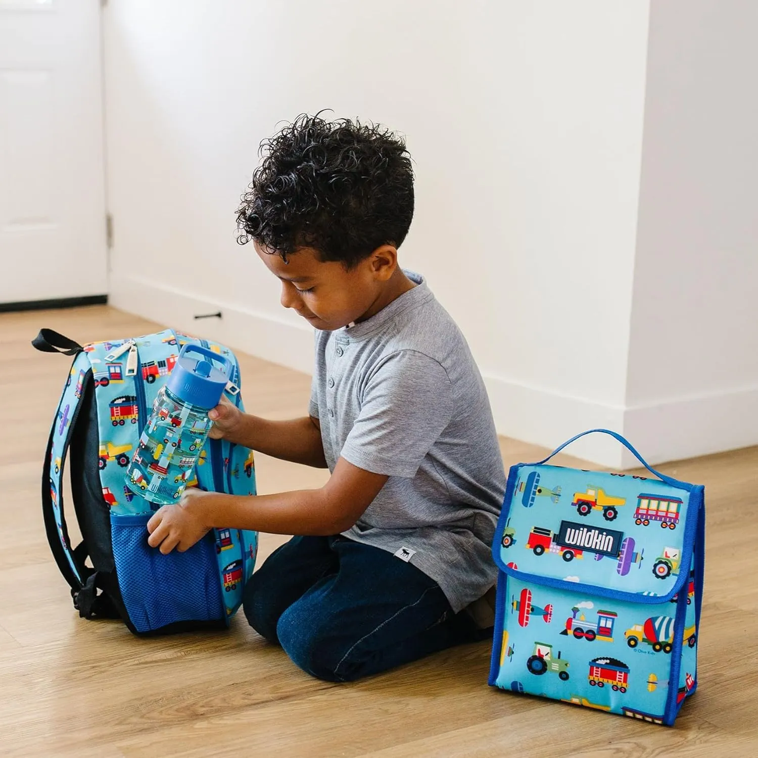 Wildkin 15-inch Kids Backpack – Durable, Padded, Adjustable for School & Travel - Trains, Planes, and Trucks